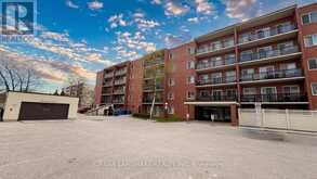 201 - 131 TAUNTON ROAD E | Oshawa Ontario | Slide Image One