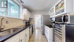 30 PAPERBIRCH DRIVE | Toronto Ontario | Slide Image Ten