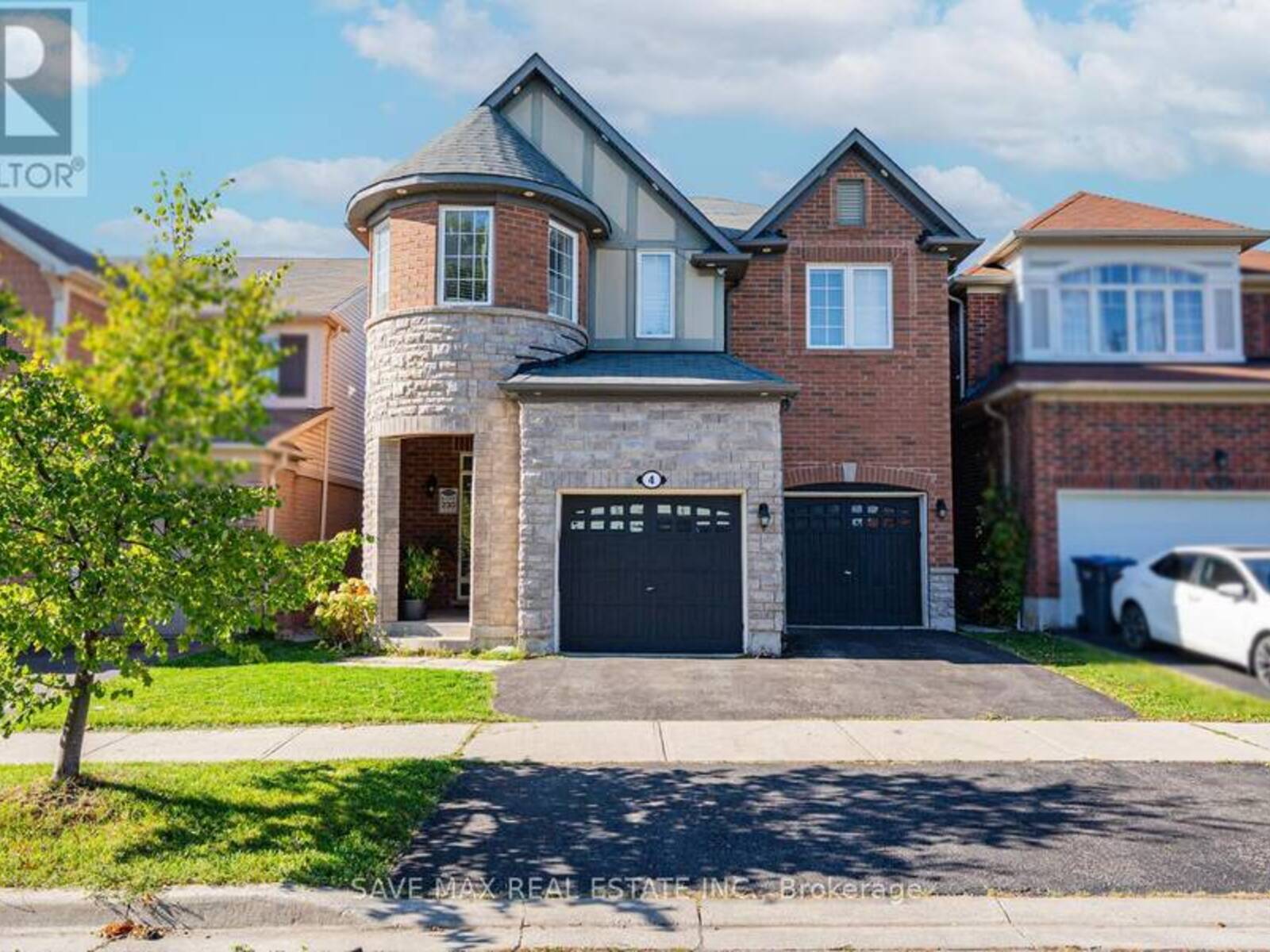 4 DONOMORE DRIVE, Brampton, Ontario L7A 0S8