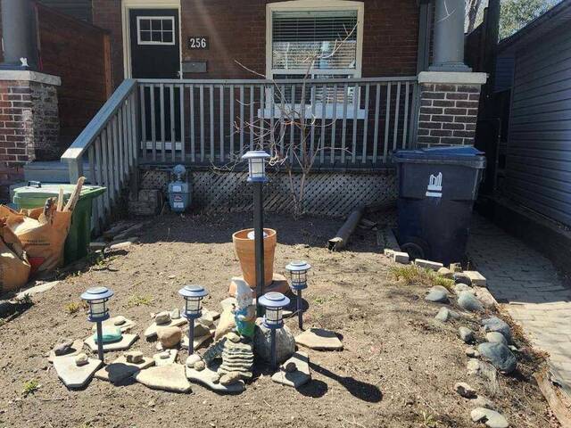 256 WOODBINE AVENUE Toronto Ontario, M4L 3P2 - Multi-family Home For Sale
