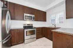 221 ISAAC DEVINS BOULEVARD | Toronto Ontario | Slide Image Three