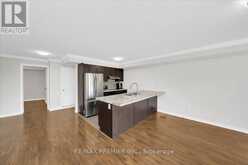 8 - 141 ISAAC DEVINS BOULEVARD | Toronto Ontario | Slide Image Eight
