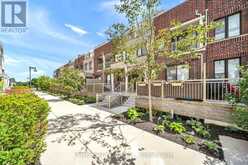 7 - 135 LONG BRANCH AVENUE | Toronto Ontario | Slide Image One