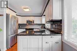 5A FALMOUTH AVENUE | Toronto Ontario | Slide Image Three