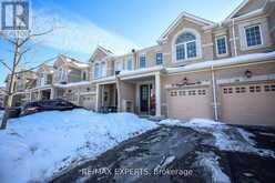 27 HOGAN MANOR DRIVE | Brampton Ontario | Slide Image One