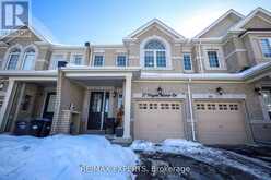27 HOGAN MANOR DRIVE | Brampton Ontario | Slide Image Three