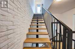 7 - 50 BARTLETT AVENUE | Toronto Ontario | Slide Image Two