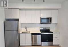 307 - 859 THE QUEENSWAY | Toronto Ontario | Slide Image Two