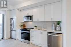 407 - 3200 WILLIAM COLTSON AVENUE | Oakville Ontario | Slide Image Five