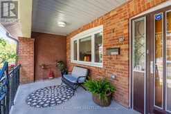 397 STRATHMORE BOULEVARD | Toronto Ontario | Slide Image Two