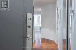 115 - 5233 DUNDAS STREET | Toronto Ontario | Slide Image One
