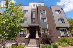 4 - 66 LONG BRANCH AVENUE | Toronto Ontario | Slide Image One