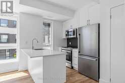 2 - 40 ED CLARK GARDENS | Toronto Ontario | Slide Image Six