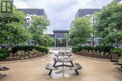 205 - 102 GROVEWOOD COMMON | Oakville Ontario | Slide Image Two