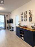 1406 - 3220 WILLIAM COLTSON AVENUE | Oakville Ontario | Slide Image Three