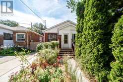 37 GOWAN AVENUE | Toronto Ontario | Slide Image Two