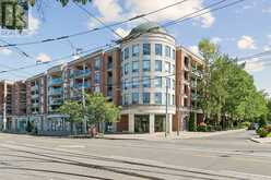 418 - 1733 QUEEN STREET E | Toronto Ontario | Slide Image One