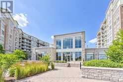 210 - 9 STOLLERY POND CRESCENT | Markham Ontario | Slide Image One