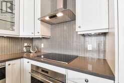 210 - 9 STOLLERY POND CRESCENT | Markham Ontario | Slide Image Five