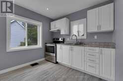 UNITS 1 + 2 + COACH HOUSE - 12 DUFFERIN STREET | Barrie Ontario | Slide Image Three