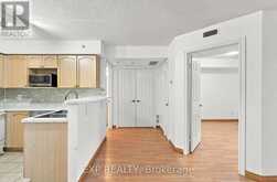 206 - 1440 BISHOPS GATE | Oakville Ontario | Slide Image Three