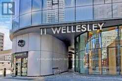 703 - 11 WELLESLEY STREET W | Toronto Ontario | Slide Image One