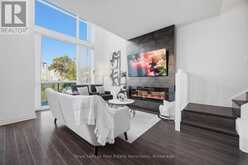 305 - 220 BURNHAMTHORPE ROAD W | Mississauga Ontario | Slide Image One
