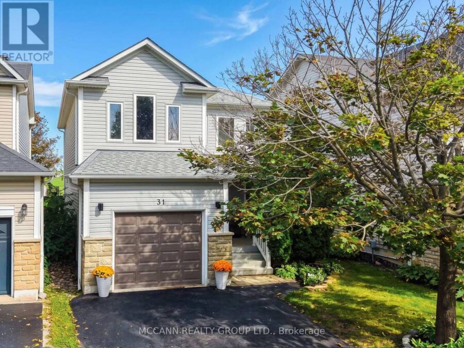 31 HATCH STREET, Whitby, Ontario L1M 2H8