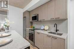 301 - 1808 ST. CLAIR AVENUE W | Toronto Ontario | Slide Image One