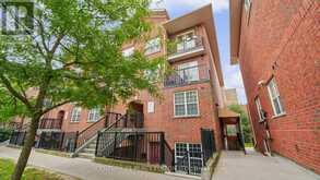 101 - 45 STRANGFORD LANE | Toronto Ontario | Slide Image One