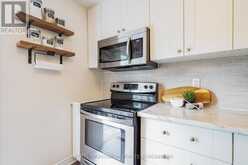 E4 - 63 FERRIS LANE | Barrie Ontario | Slide Image Six