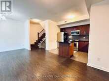 TH10 - 19 ANNDALE DRIVE | Toronto Ontario | Slide Image Two