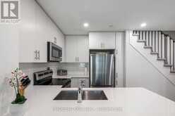 13 - 100 LONG BRANCH AVENUE | Toronto Ontario | Slide Image Eleven