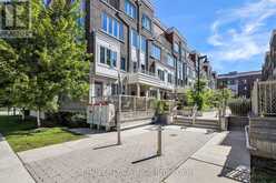 13 - 100 LONG BRANCH AVENUE | Toronto Ontario | Slide Image One