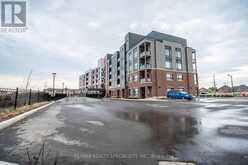 112 - 3265 CARDING MILL TRAIL | Oakville Ontario | Slide Image One