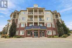 320 - 80 ASPEN SPRINGS DRIVE | Clarington Ontario | Slide Image One