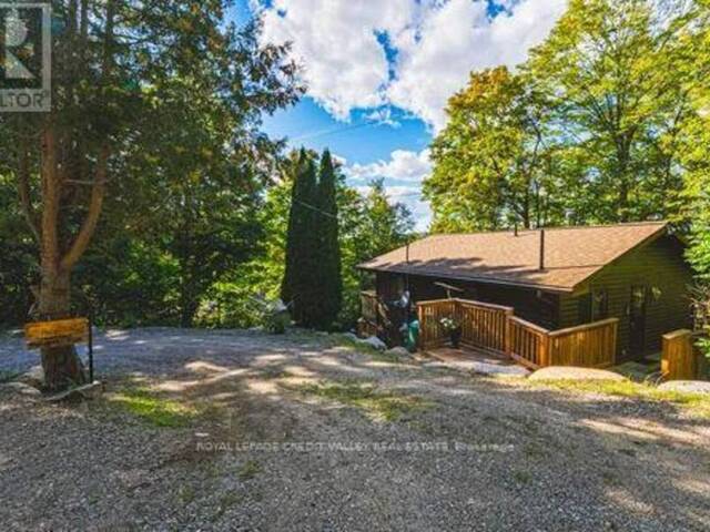 1064 WHISKEY JACK LANE Algonquin Highlands Ontario, K0M 1J1 - 3 Bedrooms Waterfront Home For sale