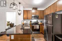 110 - 102 GROVEWOOD COMMON CIRCLE | Oakville Ontario | Slide Image Three