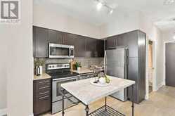 313 - 65 SPEERS ROAD | Oakville Ontario | Slide Image Five