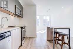 208 - 11 MARYPORT AVENUE | Toronto Ontario | Slide Image One