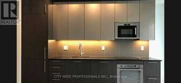 1404 - 403 CHURCH STREET | Toronto Ontario | Slide Image Two