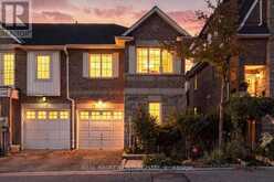 70 - 77 NORMAN WESLEY WAY | Toronto Ontario | Slide Image Two