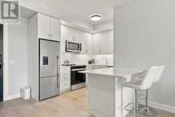 402 - 3220 WILLIAM COLTSON AVENUE | Oakville Ontario | Slide Image Twenty-five