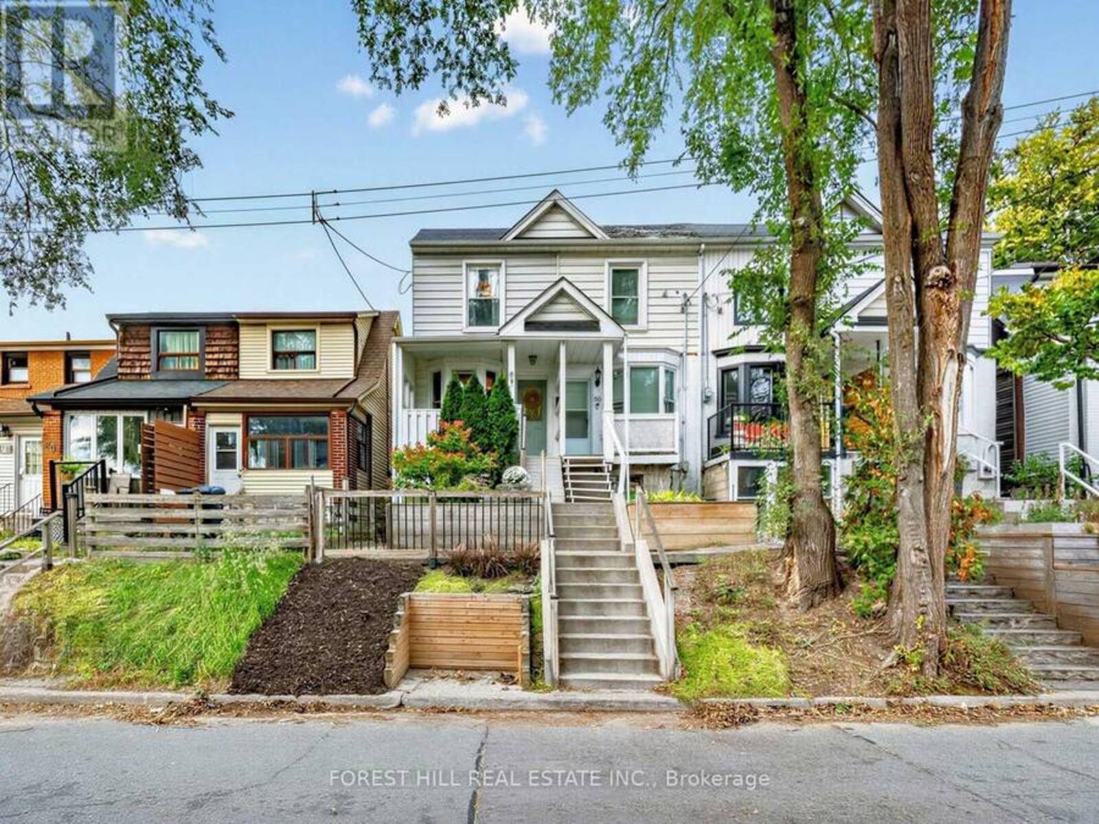 84 WALPOLE AVENUE, Toronto, Ontario M4L 2J1