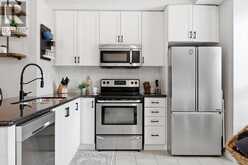 9 - 5030 CORPORATE DRIVE | Burlington Ontario | Slide Image Two