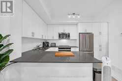 23 - 22 LYTHAM GREEN CIRCLE | Newmarket Ontario | Slide Image One