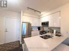 520 - 50 THOMAS RILEY ROAD | Toronto Ontario | Slide Image Three