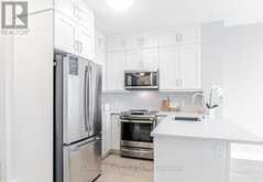 403 - 50 KAITTING TRAIL W | Oakville Ontario | Slide Image One