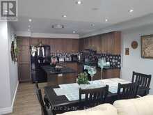 37 PRINGDALE GARDENS CIRCLE | Toronto Ontario | Slide Image Three