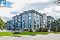 104 - 85 WELLINGTON STREET W | Aurora Ontario | Slide Image One